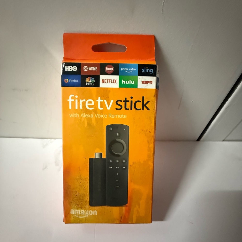 Amazon Fire TV Stick with Alexa Voice Remote - Black and Orange